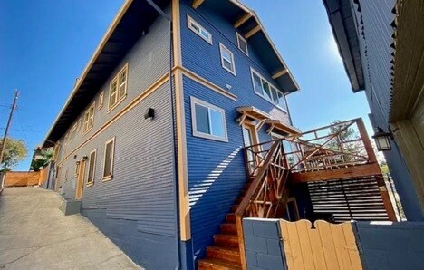 Stairs to deck and second entry to unit. - 1334 Pennsylvania Ave