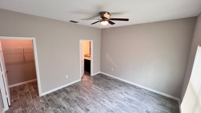 Building Photo - Spacious 3-Bedroom Home with Garage & Pati...