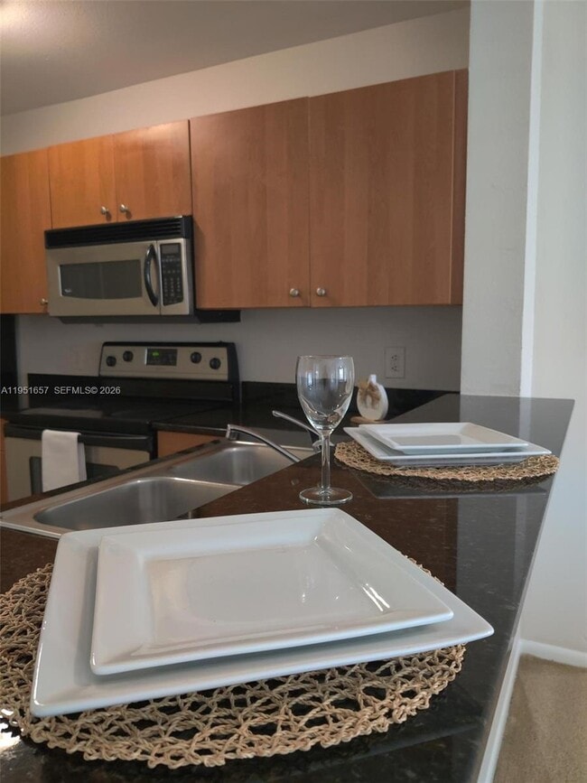 Building Photo - 1865 Palm Cove Blvd