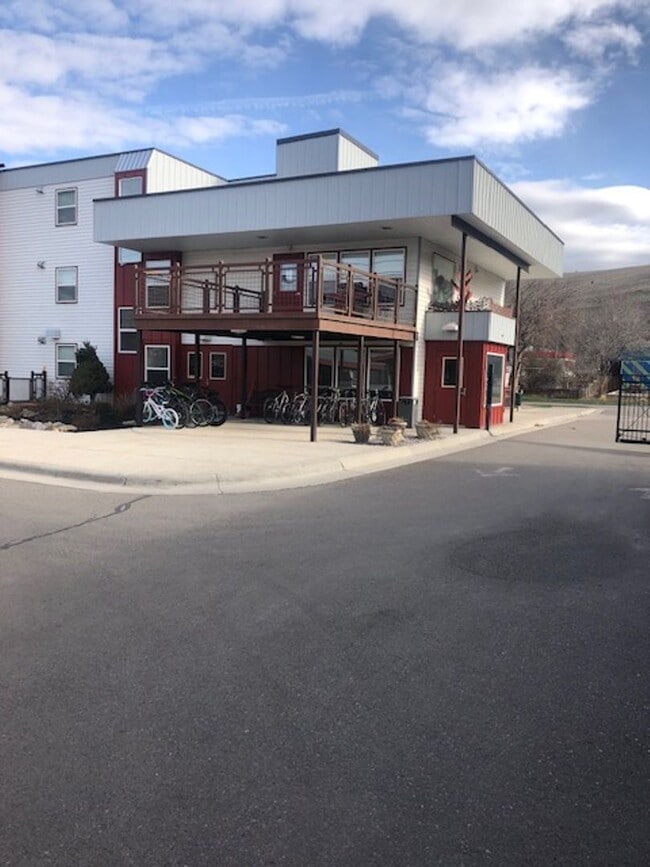 Building Photo - SAVE MONEY ON EXTENDED STAYS.  Beautiful Furnished and Completly Supplied Condo in Downtown Misso...