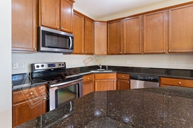 Building Photo - Luxury 3-Story Townhome, No Carpet 4 Bedro...