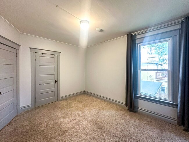 Building Photo - A home where old-world charm meets modern sophistication!