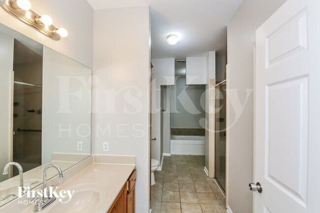 Building Photo - 8595 Shady Elm Dr