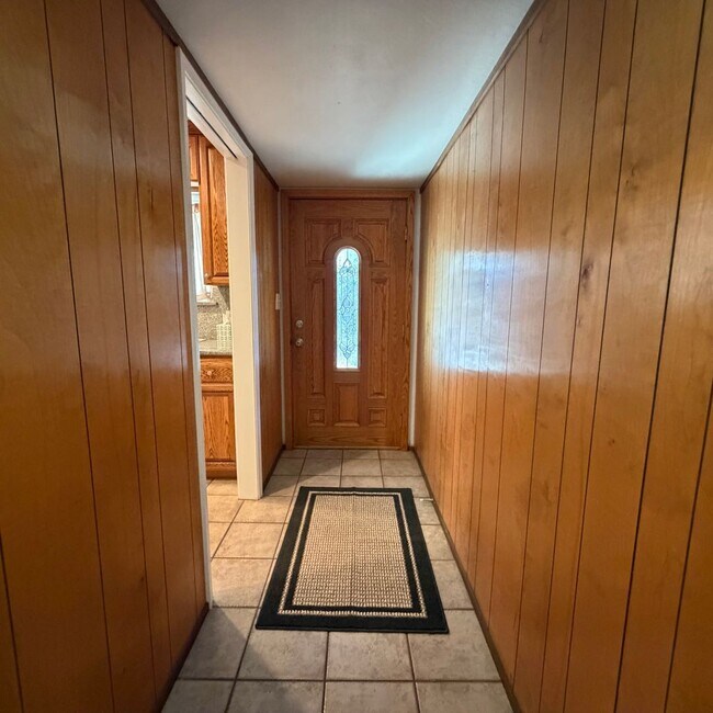 Building Photo - Adorable house with large deck,  yard and RV access