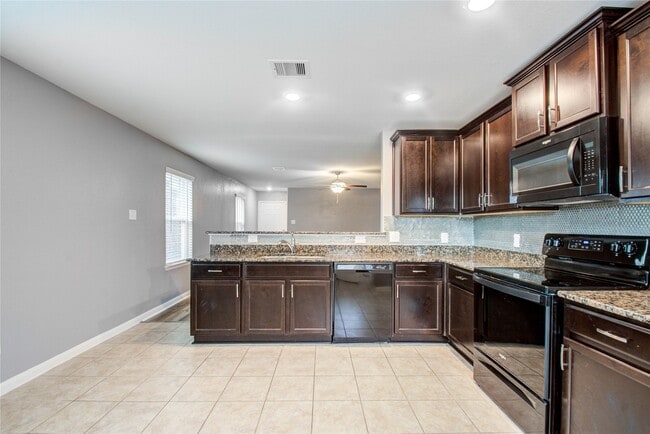 Building Photo - 6222 El Topacio Dr