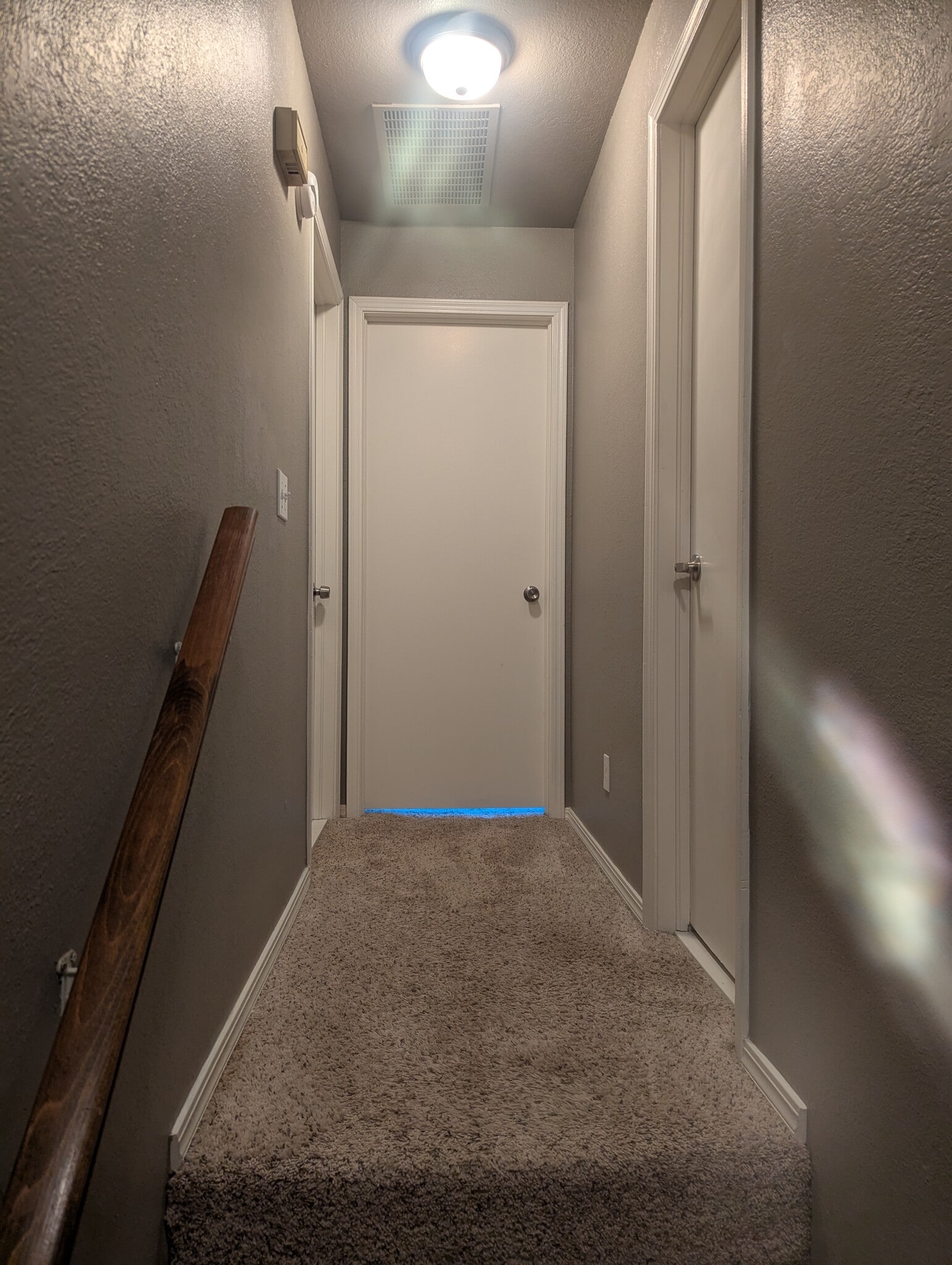 Hallway to bedrooms and bathroom - 14429 N Pennsylvania Ave