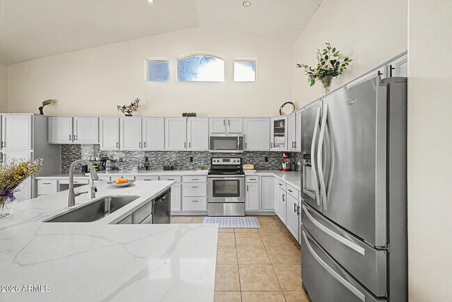 Building Photo - 8663 W Yukon Dr