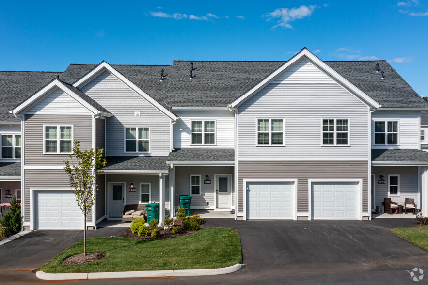 Townhomes include Private Attached Garage - The Madison at Marshfield