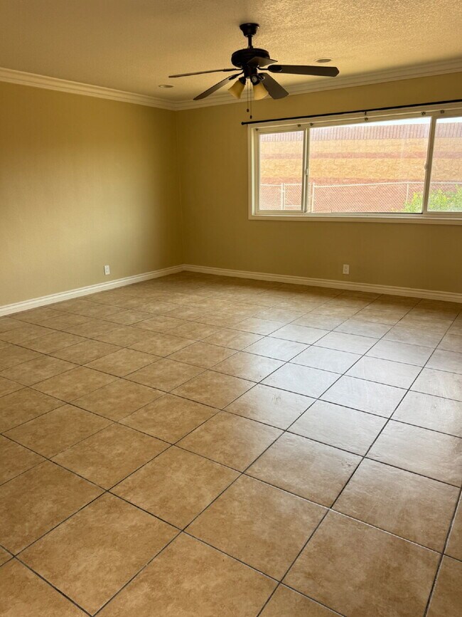 Building Photo - Large yard, spacious interior, extra parking and much more
