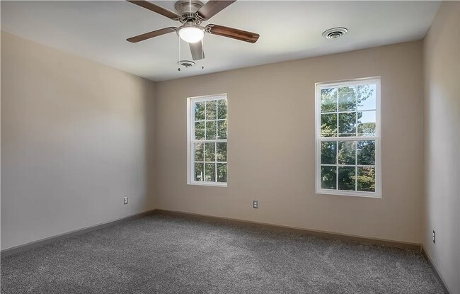 Building Photo - This Charming Two-Story Home Awaits You