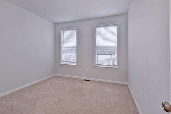 Building Photo - Three Story Brick End Unit with Rooftop Terrace