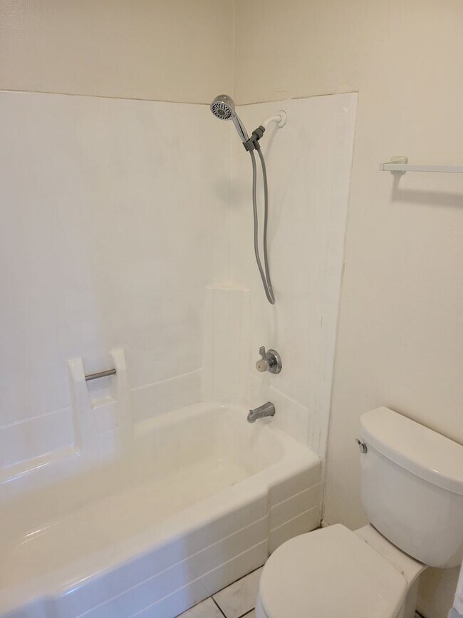 Building Photo - Plenty of Natural Light! Spacious Townhouse conveniently across Dominguez Hills!