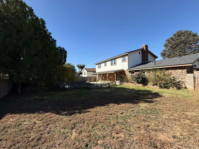 Building Photo - 4 Bed Brick Home! Zia School District! - Pets Welcome!!!