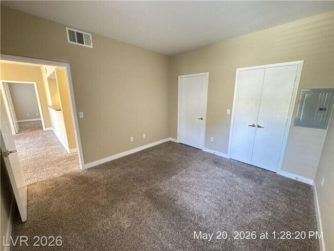 Building Photo - Gated Green Valley Condo with Dual Walk-In Closets & Resort Amenities