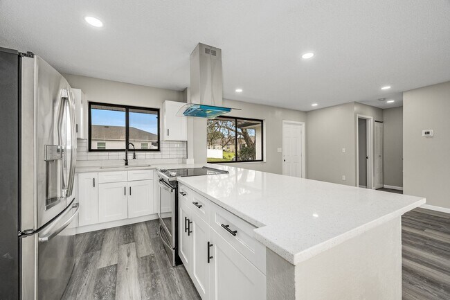 Building Photo - Charming Palm Bay Retreat - Perfect for Relaxation and Entertainment!