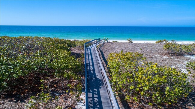 Building Photo - 261 Barefoot Beach Blvd