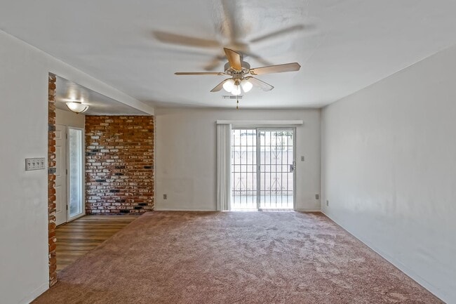 Building Photo - SPACIOUS, BRIGHT & AIRY, 3BR2BA HOME W/ GREAT OUTDOOR SPACE, LARGE DRIVEWAY W/ COVERED CARPORT & ...