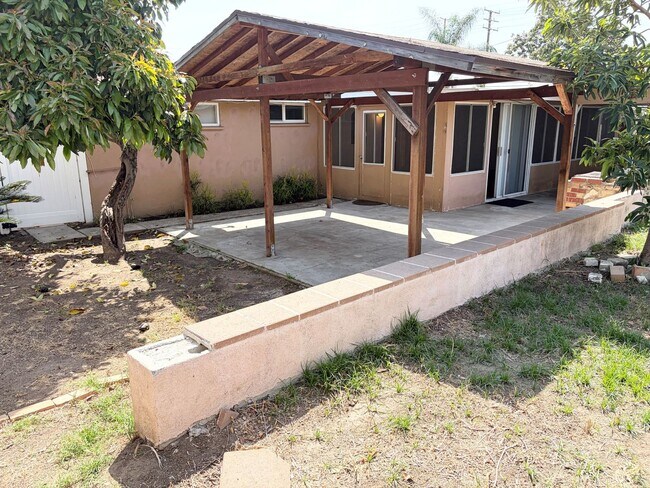 Building Photo - Gated Main House with Private Backyard & Bonus Room