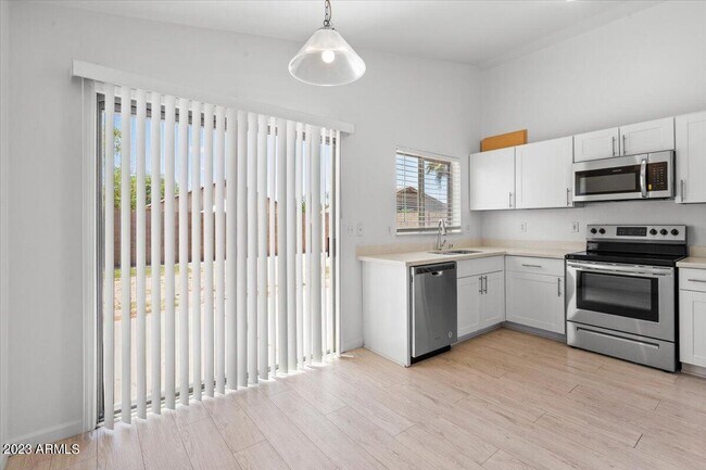 Building Photo - 14975 W Acapulco Ln