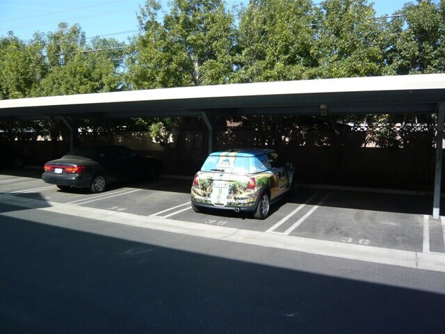 Building Photo - Fresh and Clean Upstairs Condo W/One Car Garage, Reduced Deposit