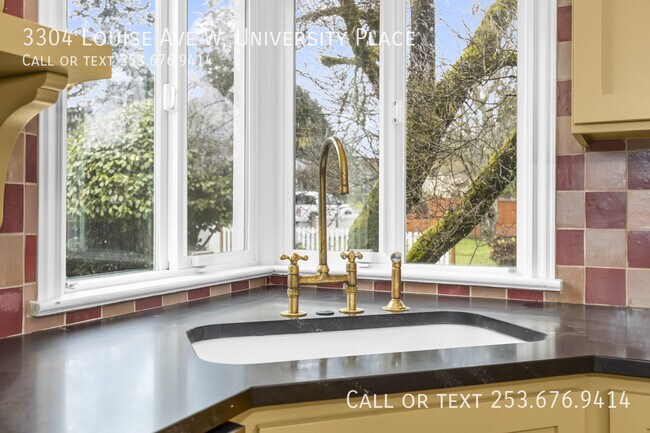 Building Photo - 3304 Louise Ave W