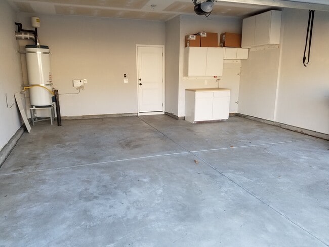 Two car garage w/ storage closet and cabinets - 1545 Oldenburg Dr
