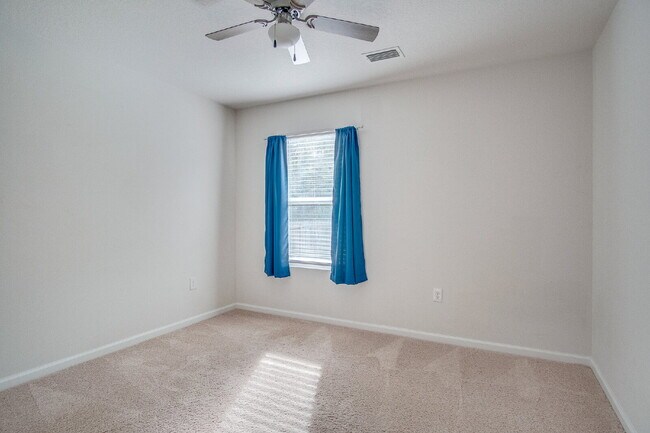 Building Photo - Season’s Savings! Spacious 5BR Near NAS – Military Half Deposit & $500 Off First Month!