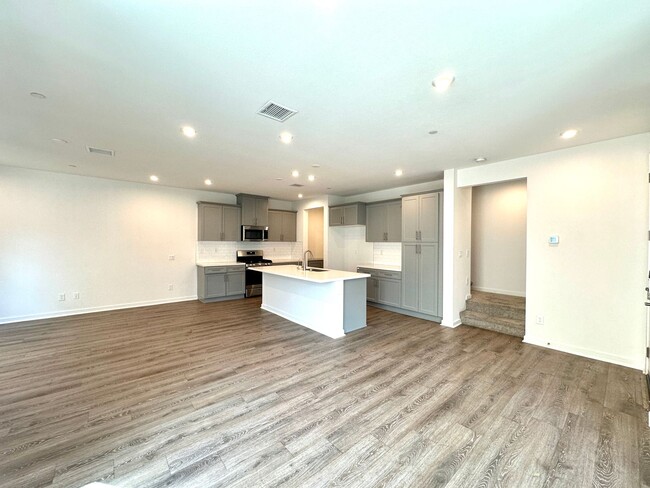 Building Photo - "Spacious 4-Bedroom Retreat with Modern Co...