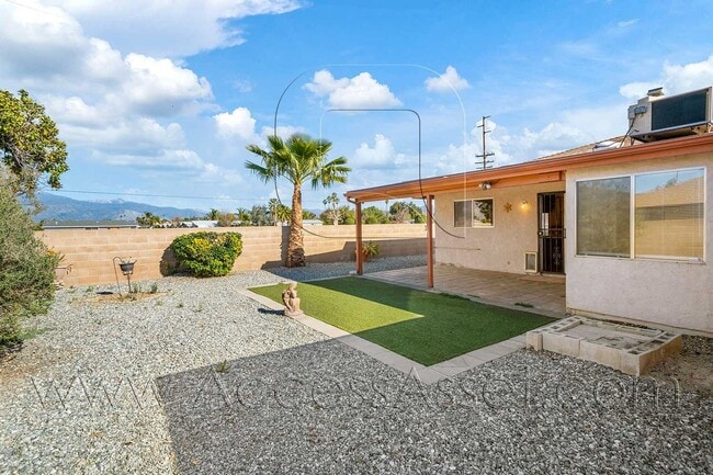 Building Photo - Single-Story 3 Bed with Covered Patio & Gated Yard