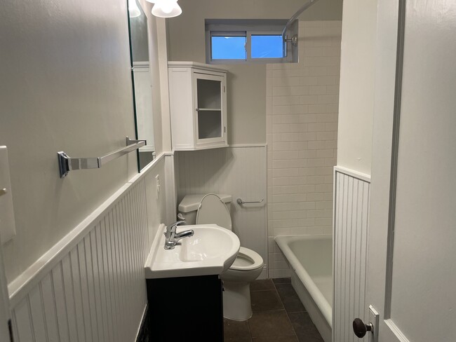 Updated bathroom with storage - 5033 Devonshire Ave