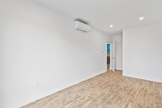 Building Photo - 213-41 38th Ave