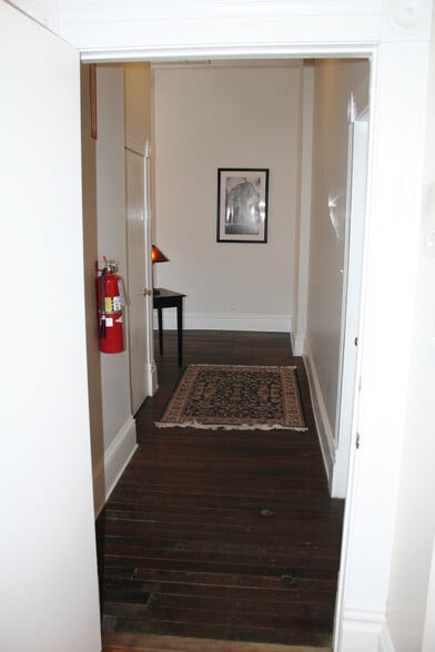 Hall to second floor apartments - 113 Innes E St