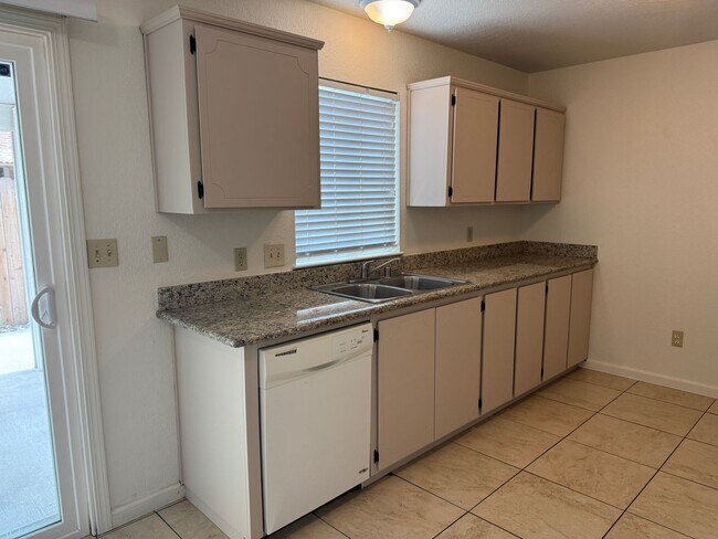 Building Photo - Four Bedroom, Two Bathroom, Water/Sewer/Trash and Yard Maintenance Included!