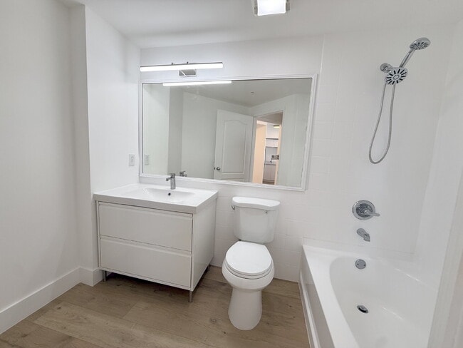 Building Photo - Rare 2/2 Corner Penthouse with Panoramic Lagoon Views from Every Room – Available Now!