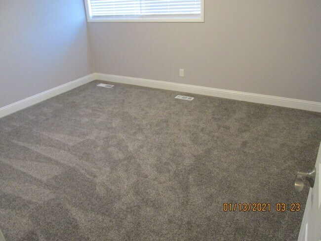 Building Photo - Remodeled !  Hardwood Flooring Throughout & New Carpet in Bedrooms, Tile, Granite, Large Living r...
