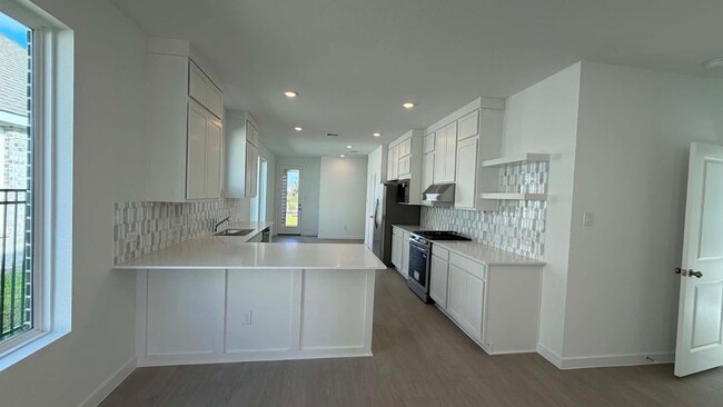 Building Photo - 27451 Sunterra Village Dr