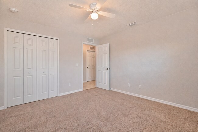 Building Photo - Spacious Three-Bedroom Home with Open Floor Plan, Large Yard & Screened Patio