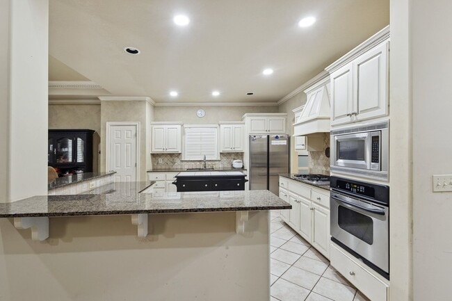 Building Photo - 4 Bedroom + Bonus Room & Office with Gorgeous Pool