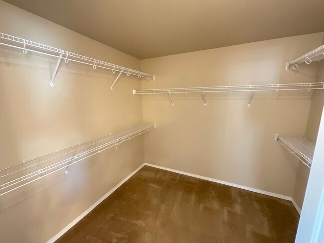Building Photo - 4 Bedroom Home Available Near Voyager Pkwy...