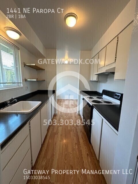Building Photo - 1441 NE Paropa Ct