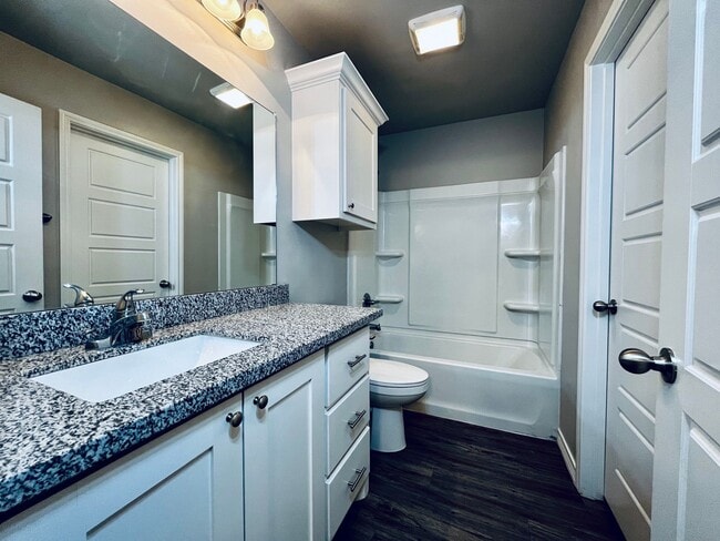 Building Photo - 4 Private Suites • Walk to Texas Tech • Modern Finishes