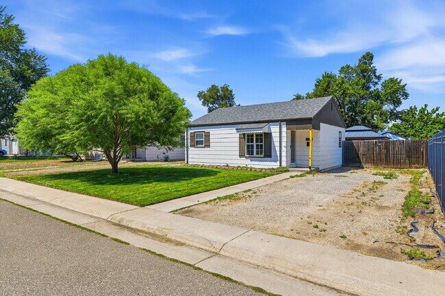 Building Photo - $1,545.95, 2-bed, 1-bath home in Brighton with a large fenced backyard.