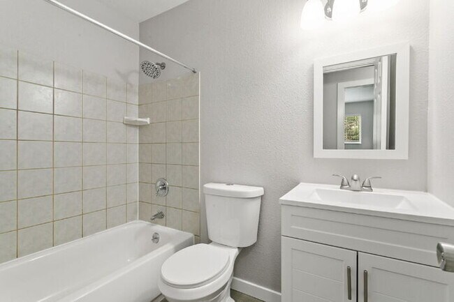 Building Photo - Freshly Renovated 4-Bedroom Home with Over...