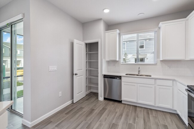 Building Photo - Beautiful Brand New 3/2.5 Townhome W/ 2 Ca...