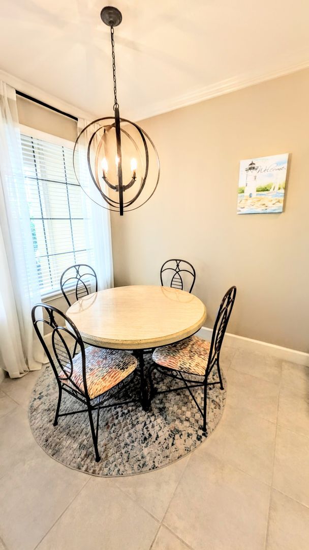 Building Photo - Seasonal/short term turnkey furnished Incredible 2/2 with den ground floor condo in resort Esplan...
