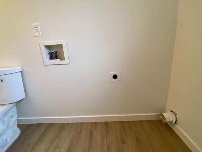 Building Photo - Stylishly Renovated Home with Private Back...