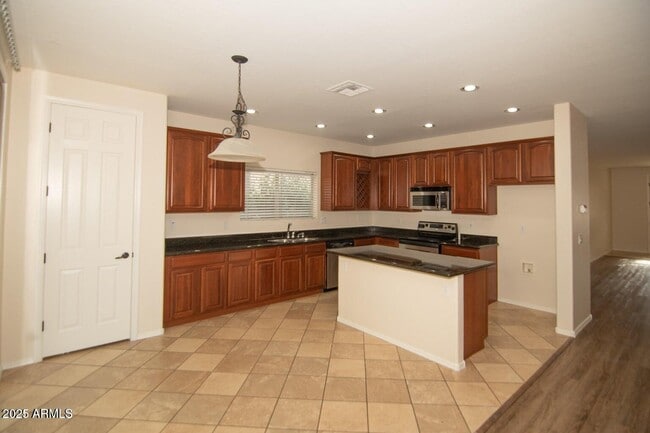 Building Photo - 605 N 111th Dr