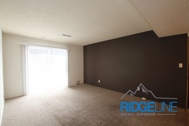 Building Photo - Centrally Located Condo for Lease - ALL UT...