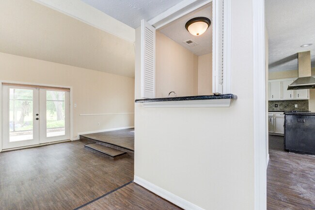 Wetbar(right) & Sun room entrance (left)e - 3518 Covey Trail Dr