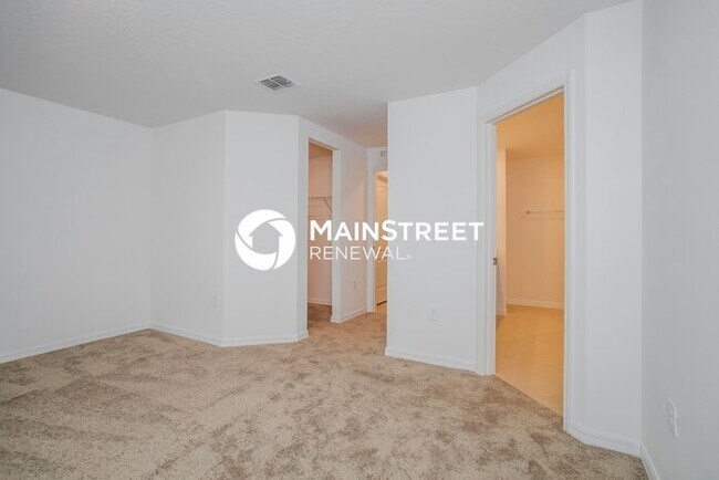 Building Photo - 4 Bedroom Pet-Friendly Home in Mascotte, FL with Main Street Renewal